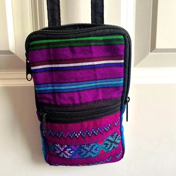 Handbags - NWOT Beautiful cell phone bag. Bright purple & pink. Adjustable strap.